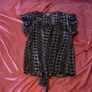 I’m selling this item because it doesn’t fit me but it is a really cute blouse.